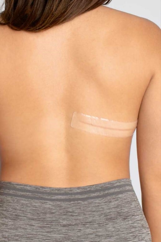 Amoena Silicone Scar Patch Strip applied to a womans body