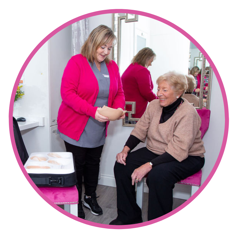 A lady viewing breast prostheses options