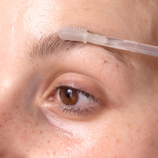 Meme Eyebrow & Eyelash Booster Serum for Regrowth applying on eyebrow